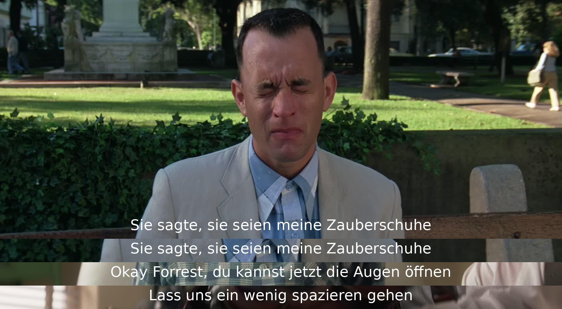 Mama sagte, sie würden mich überall hinbringen und dass sie meine Zauberschuhe seien. Dann fordert Forrest Gump auf, die Augen zu öffnen und gemeinsam spazieren zu gehen.