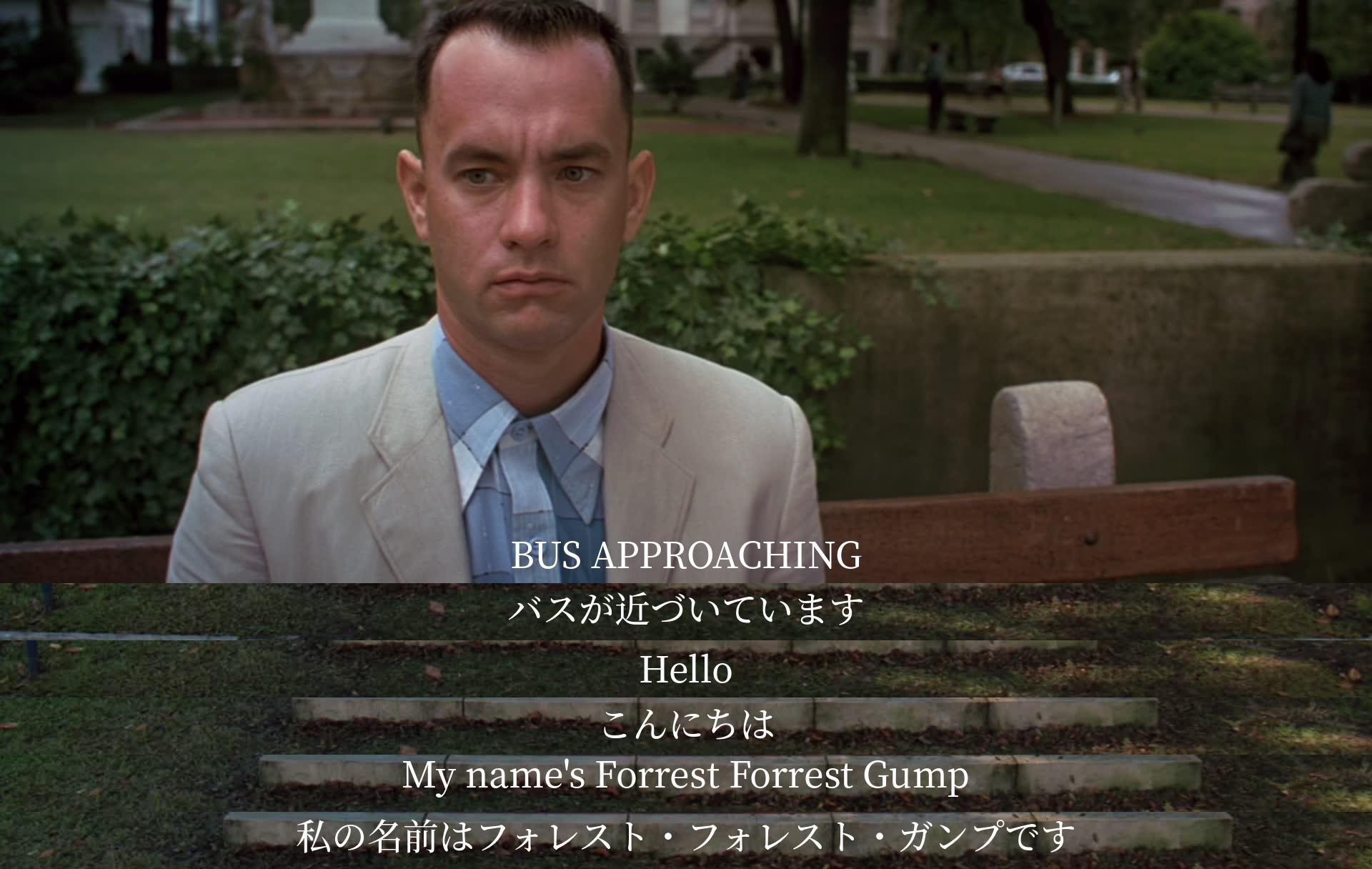 A man named Forrest introduces himself on a bus, saying "Hello, my name's Forrest Forrest Gump."