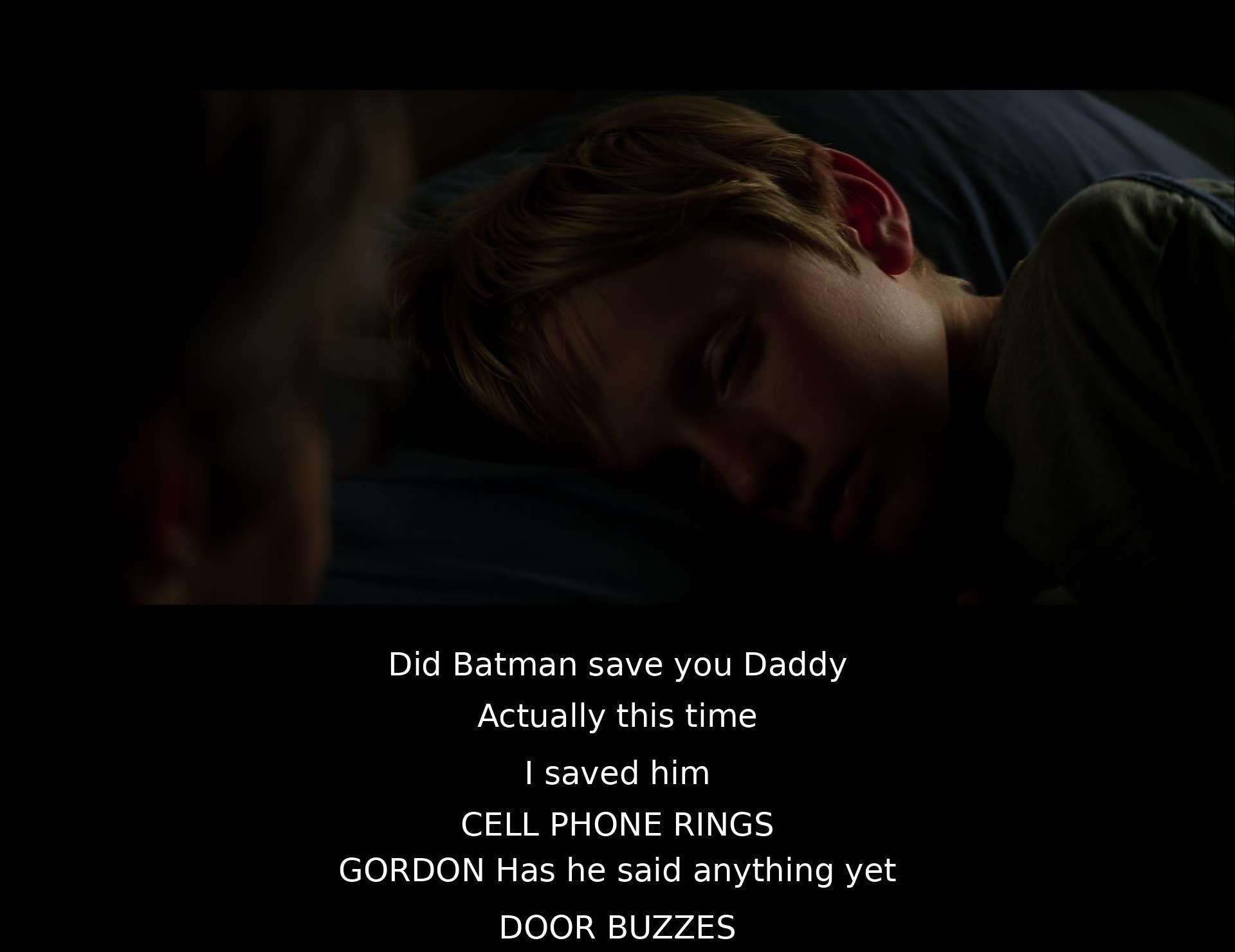 A father and his daughter discuss Batman saving someone, but the father reveals that he saved Batman. Shortly after, a cell phone rings and a door buzzes while someone asks if Batman has spoken yet.