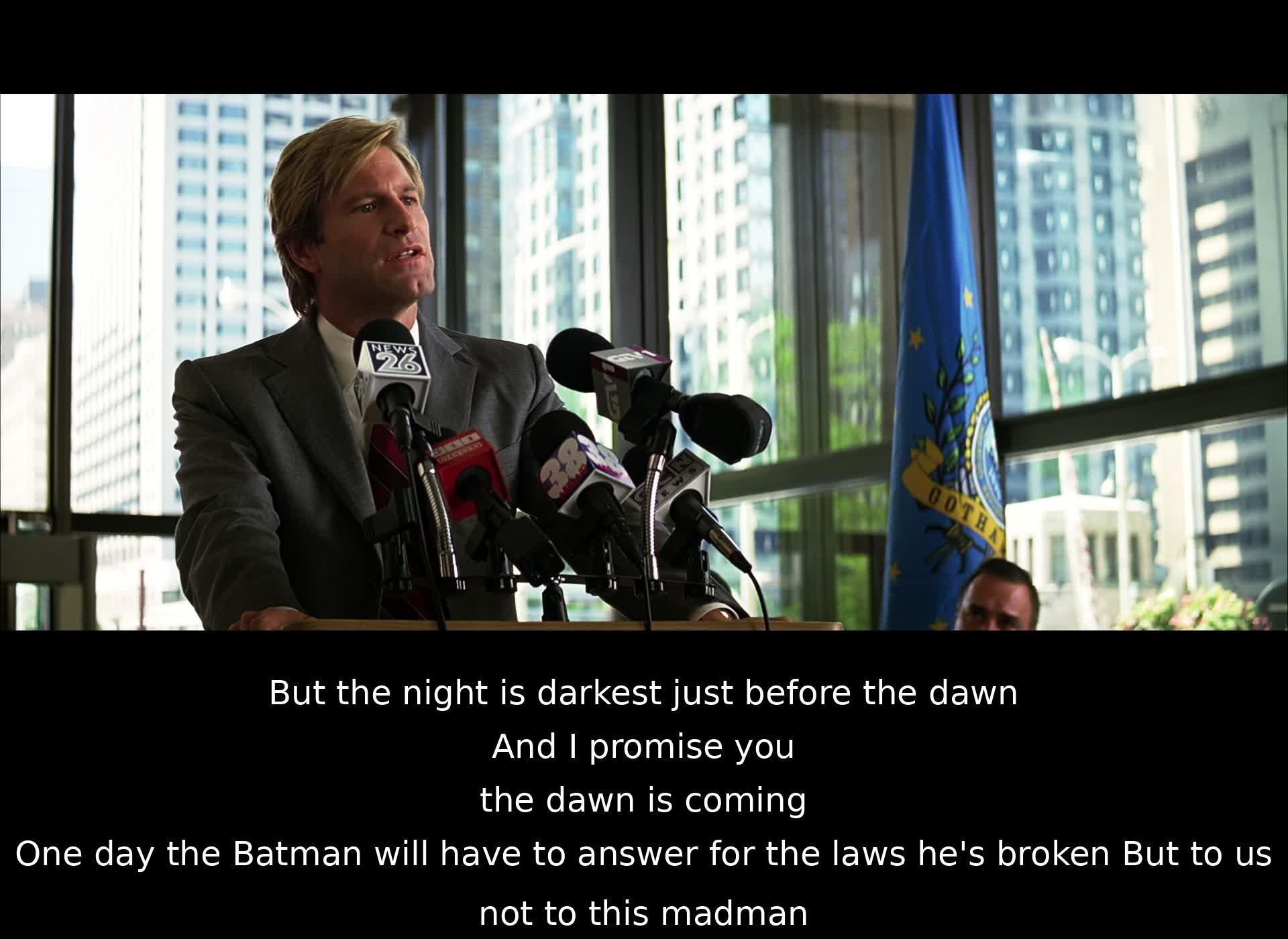 In a moment of reassurance, a character speaks of the darkness before the dawn, promising that a new day will come. He suggests that Batman will eventually face consequences for his actions, but it will be from the people, not their present enemy.